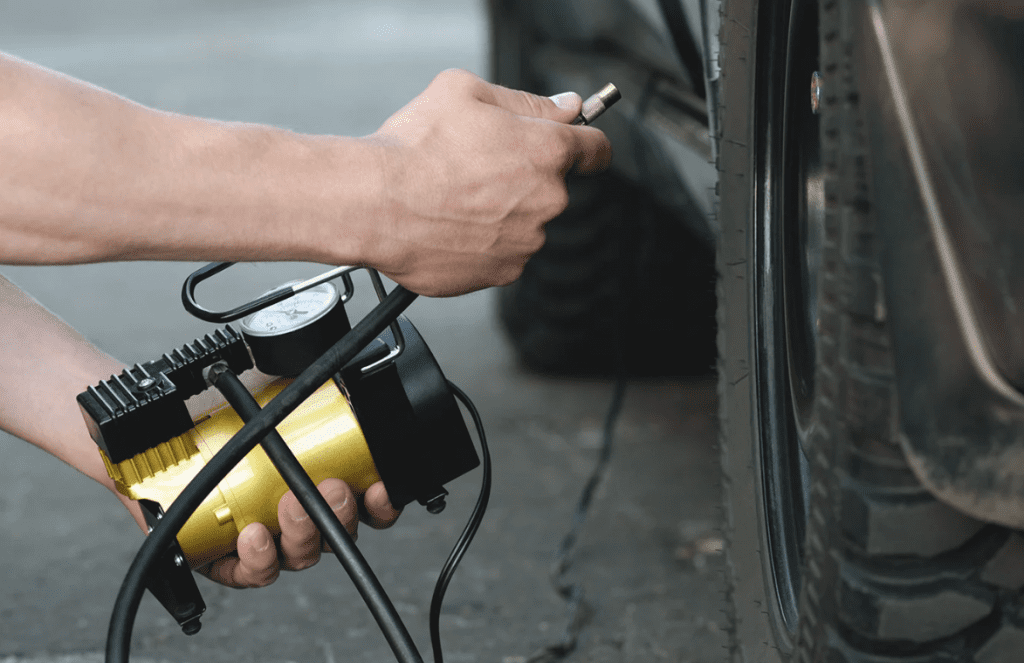 What is the difference between a tire inflator and an air compressor?
